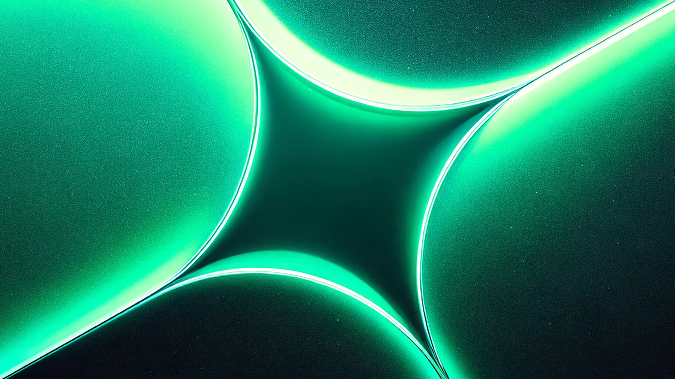 Abstract translucent glass surfaces meeting to form a star-like shape in green