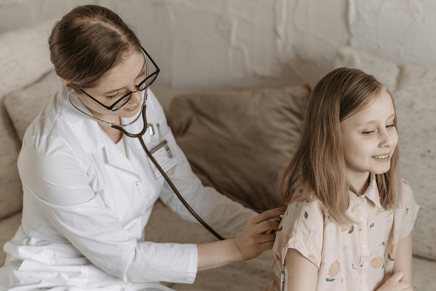 A physician treating a patient
