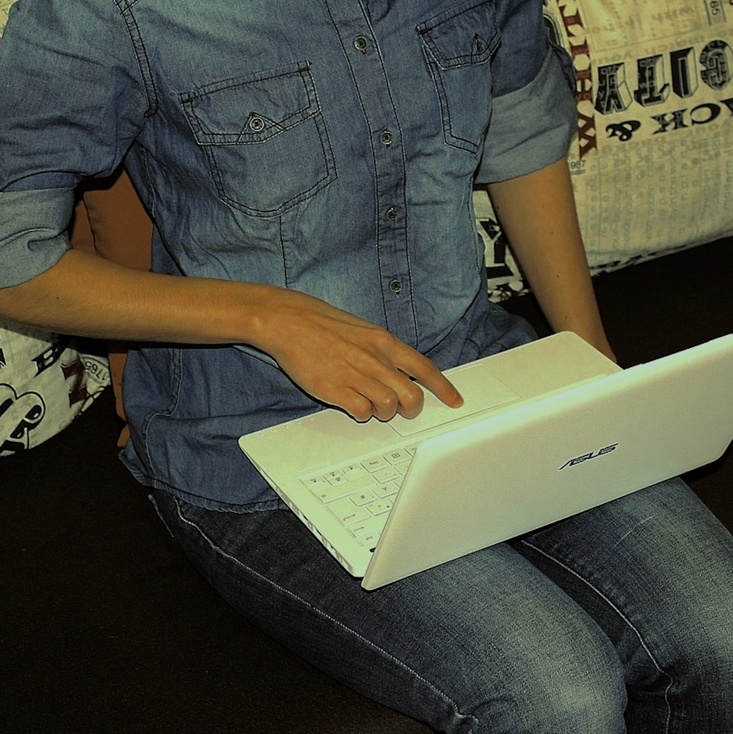 A climate tech individual working on a computer.