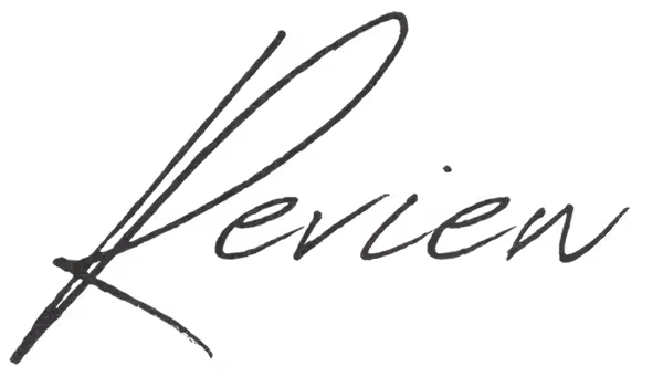 Handwritten word 'Review' in elegant cursive script.