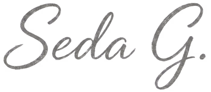 Stylized handwritten signature spelling 'Seda G.' in gray ink.