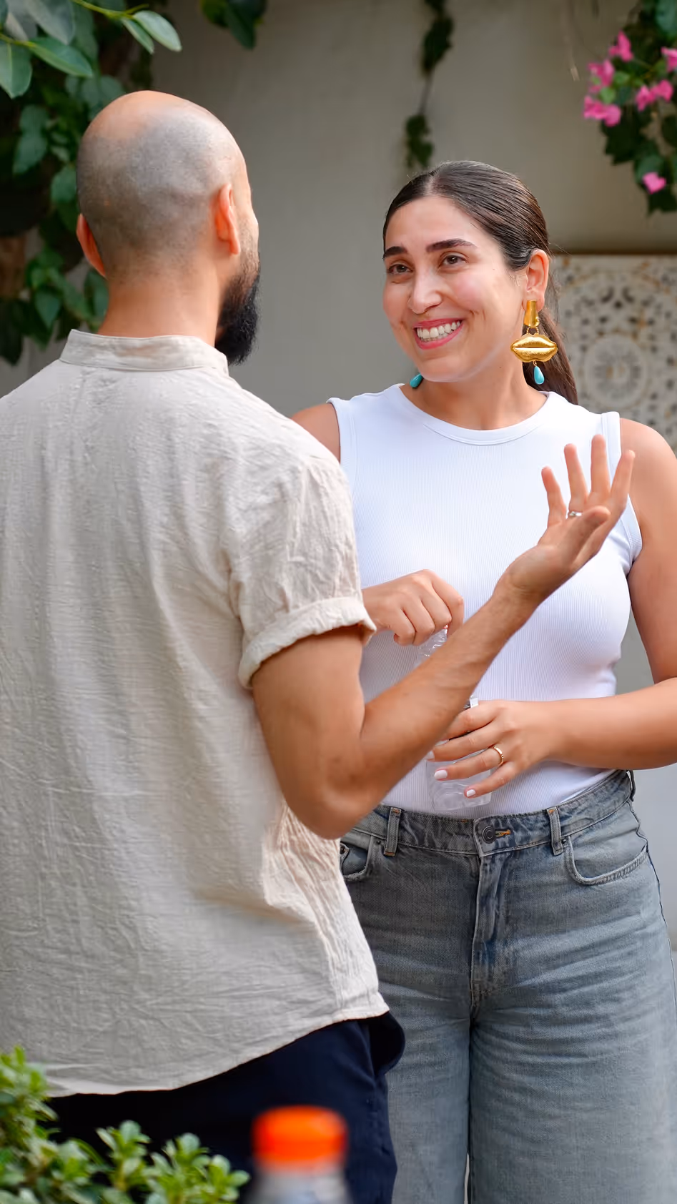 Sira members having a genuine conversation during a community gathering.