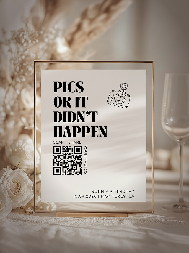 Wedding sign on a table with text 'Pics or it didn’t happen,' a QR code, camera illustration, and details for Sophia and Timothy's event on April 19, 2026 in Monterey, CA.