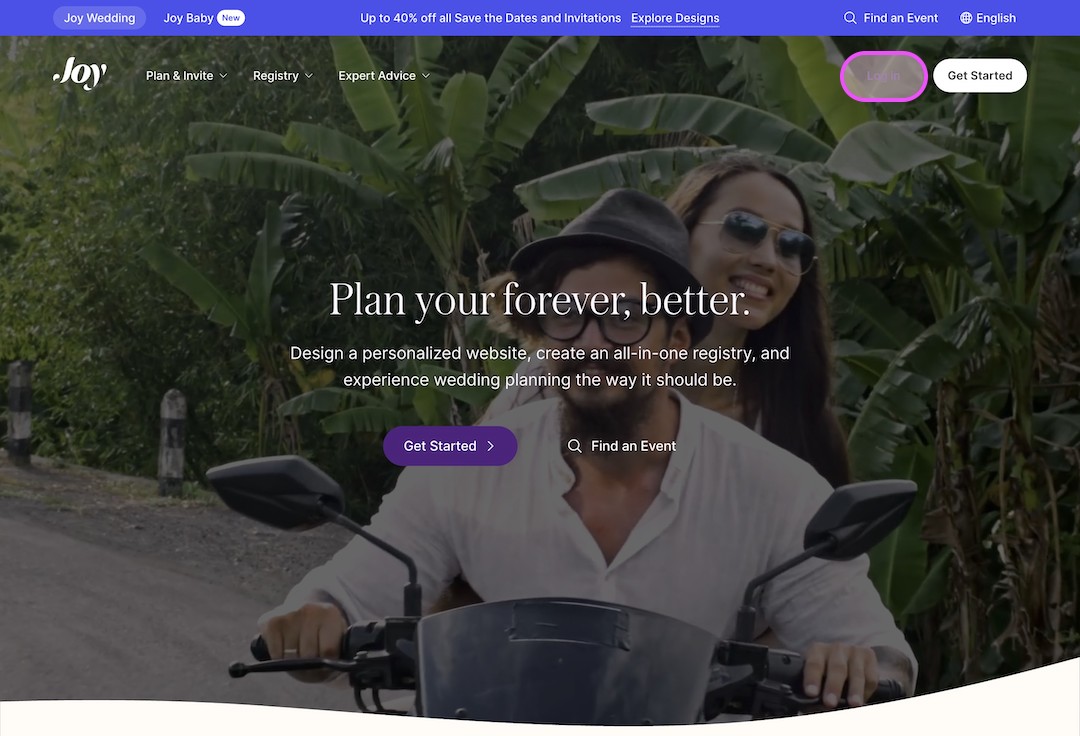 Smiling couple riding a motorcycle with green tropical plants in the background, overlaid with wedding planning website text and navigation.