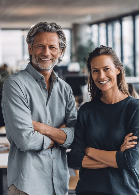 Couple smiling in an office