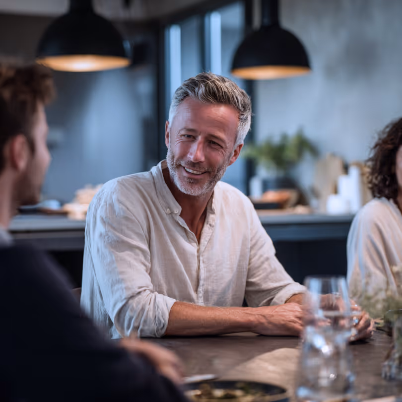 Man talking to his family