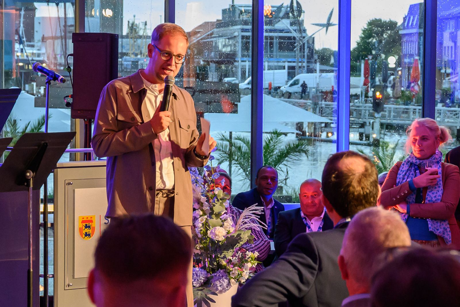 [background image] image of community event hosted by the bakery