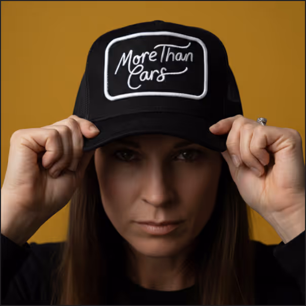 Branded hat merchandise design from the More Than Cars creative shop.