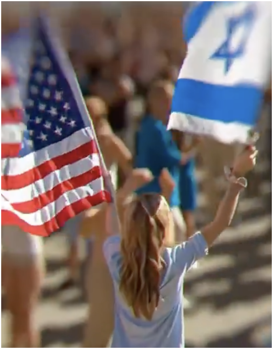 a girl waving an american flag and an israeli flag