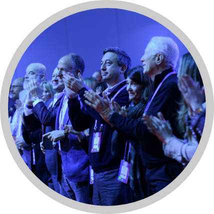 AIPAC club members clapping and smiling during an event