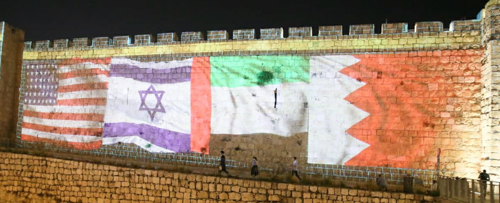 Walls of Jerusalem lit up with the U.S., Israeli, UAE and Bahrain flags