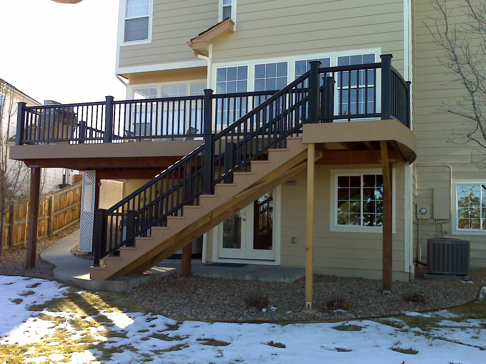 exterior deck and stairs with railing