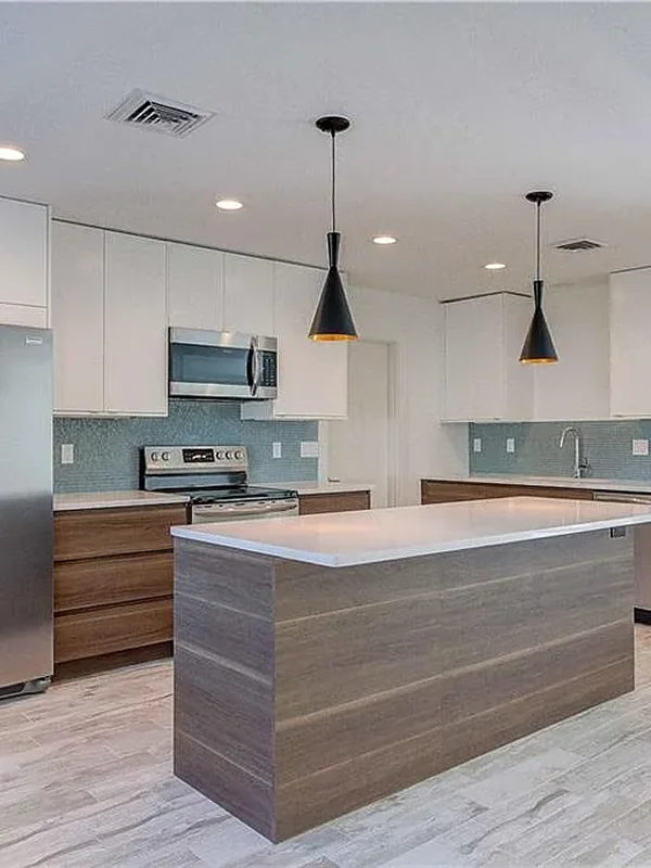 Vertical photo of Sarasota kitchen remodel with shaker cabinets