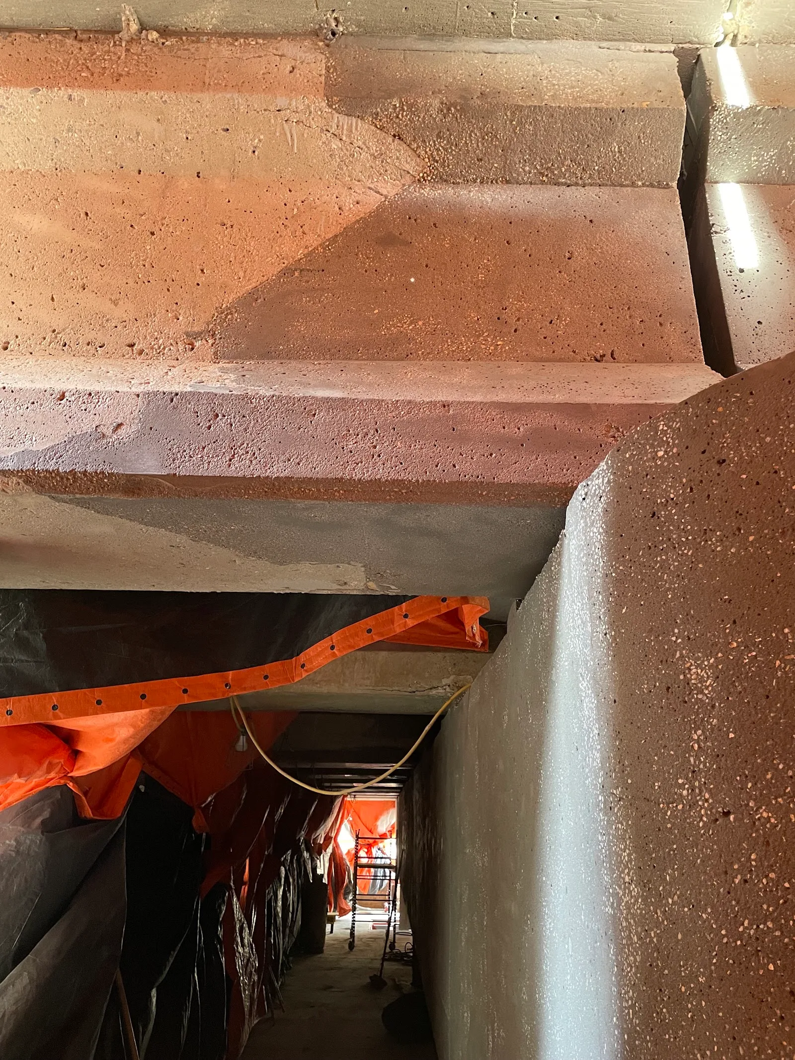 A bridge pier cap rebuilt after damaged concrete was removed.