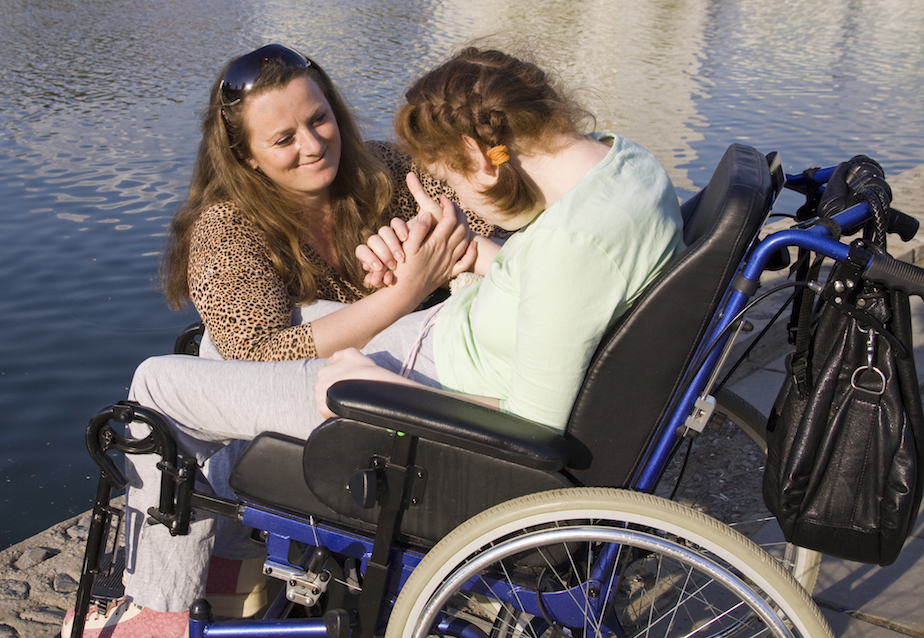adult sisters by the lake