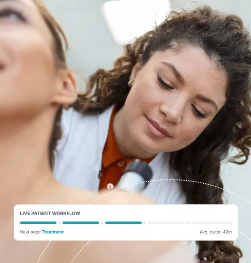 A medical professional in white coat examining a patient's shoulder, with a live patient workflow overlay.