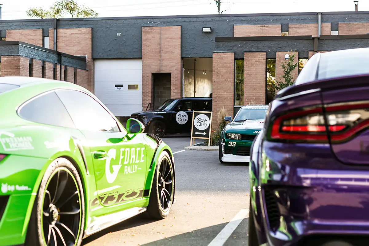 A car club meeting outside of Millrace Motor Club