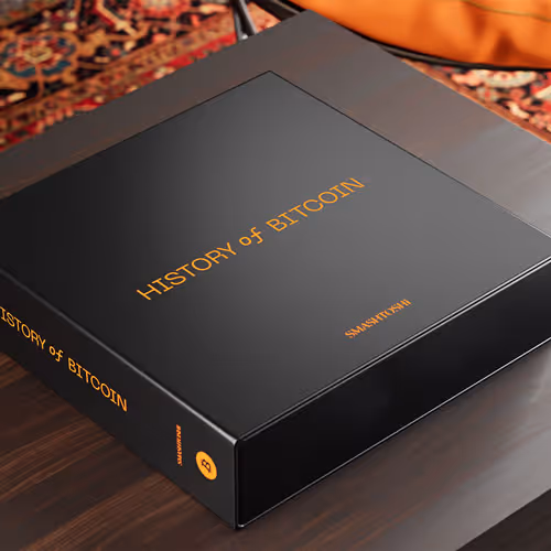 Close-up of a TV screen displaying blue and black abstract shapes with branching lines resembling veins or roots.