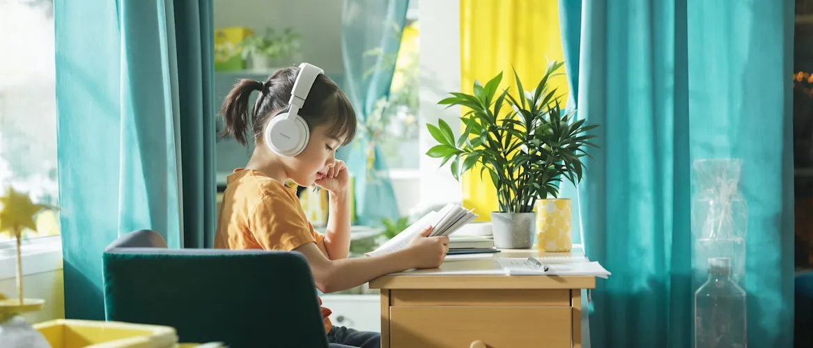 asian-child-desk-headphones-study-reading.jpeg