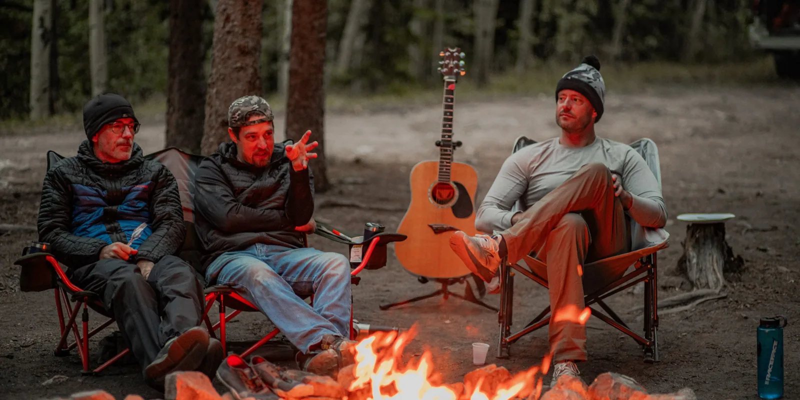 Fireside with a guitar at dusk