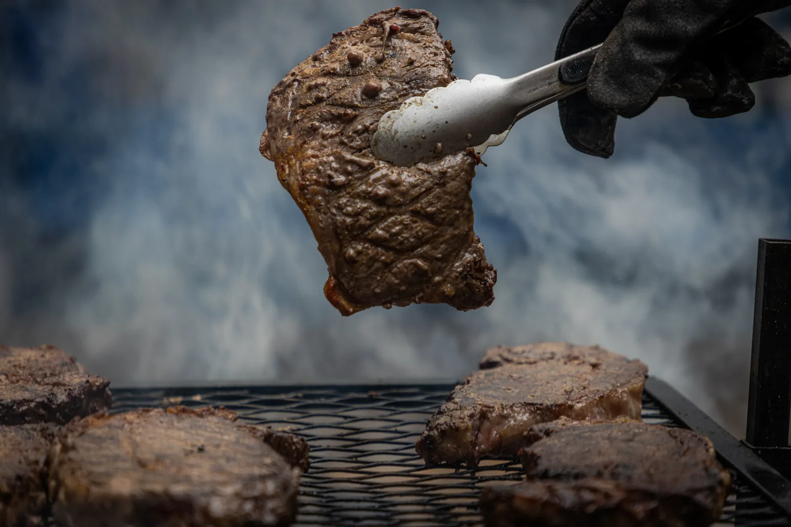 Steaks over an open flame