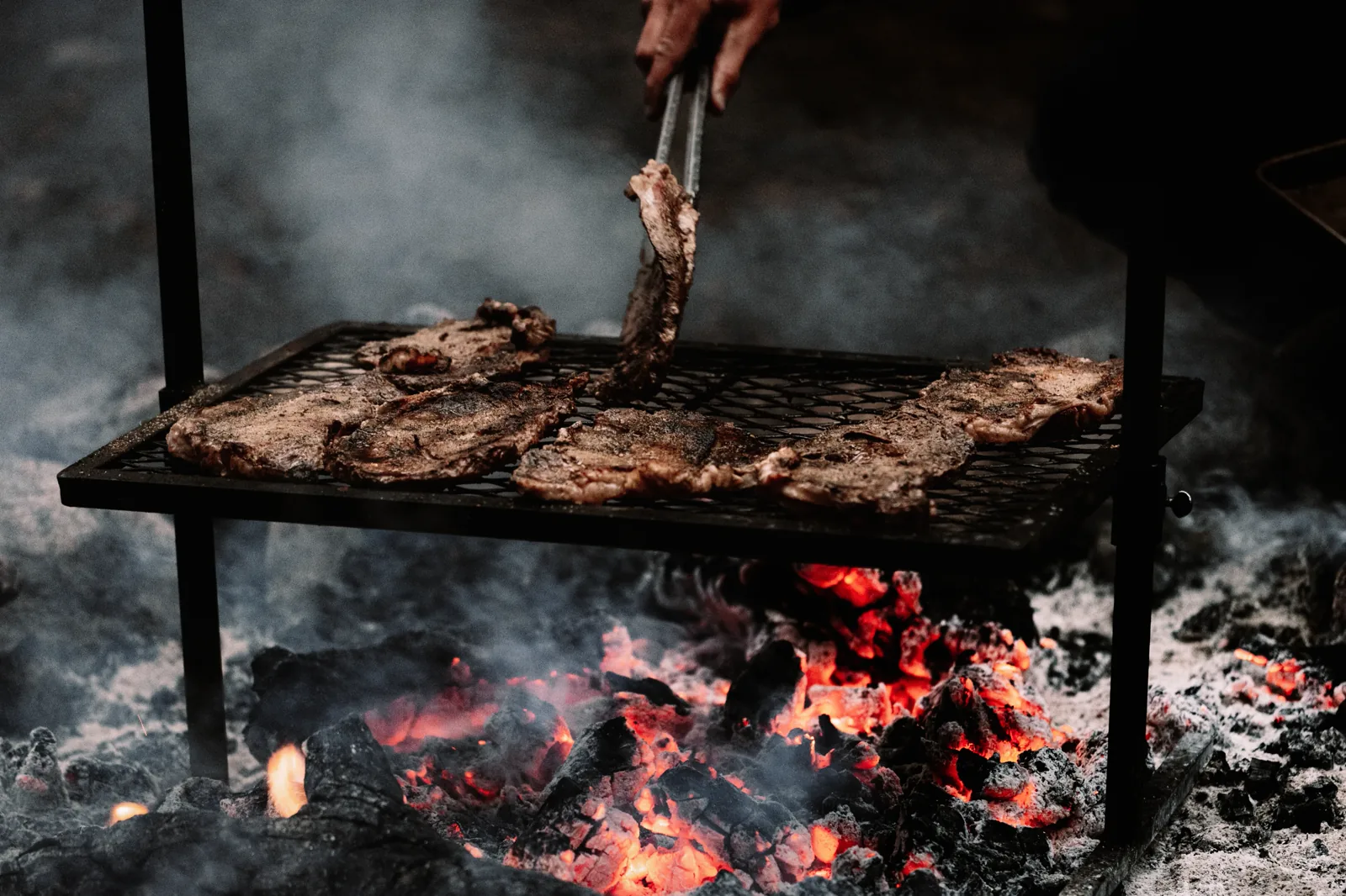Steaks over an open flame