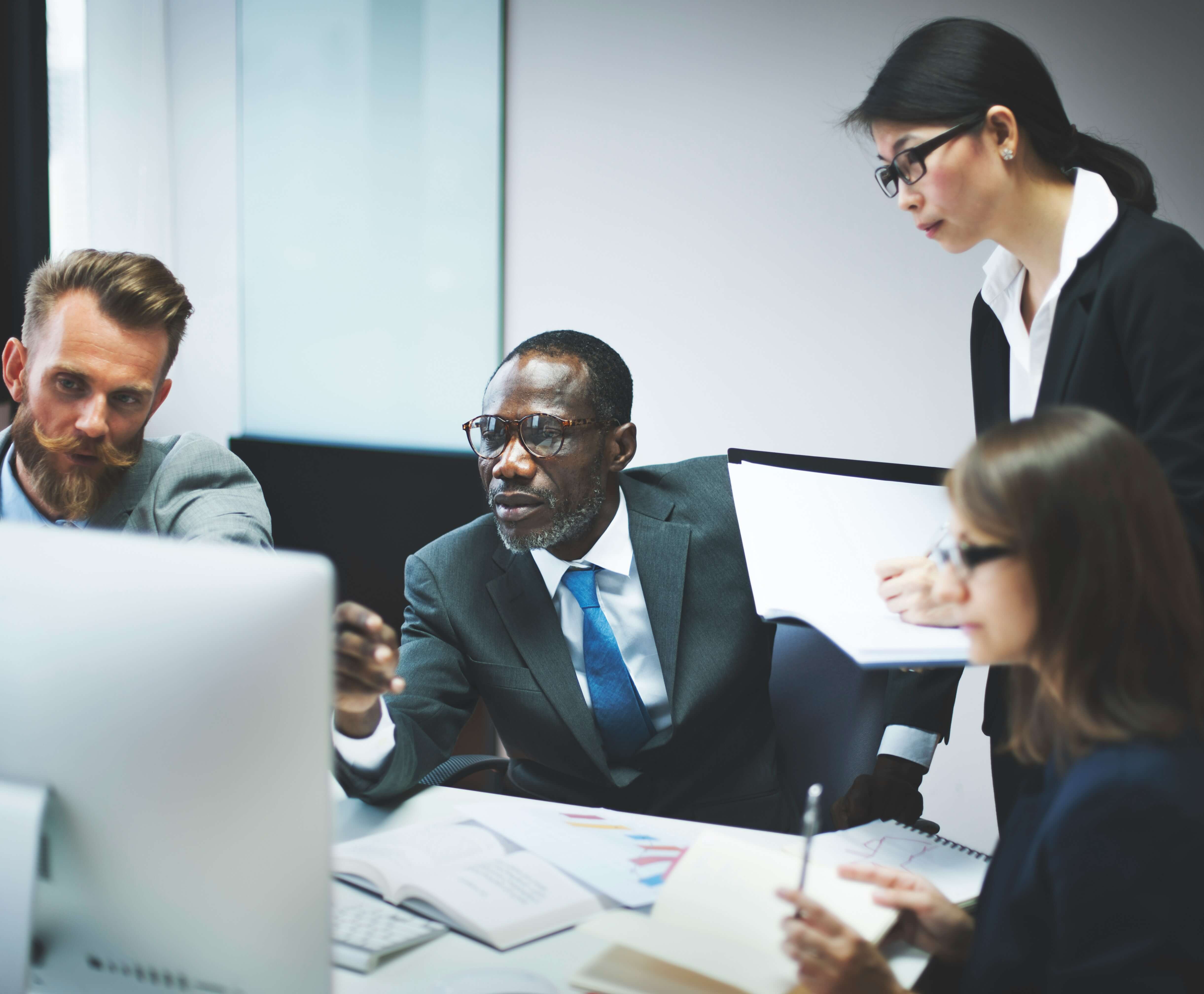image of people working in an office setting (for an ai saas company)