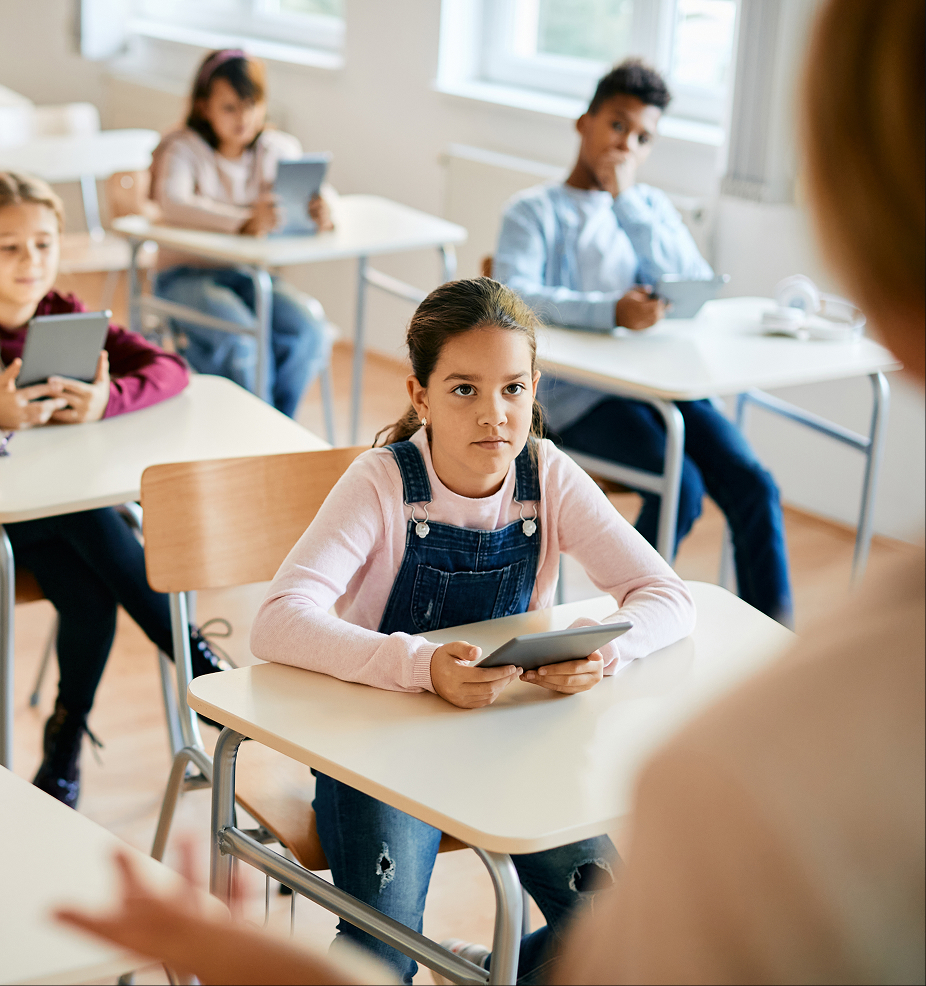 Students in classroom with tech