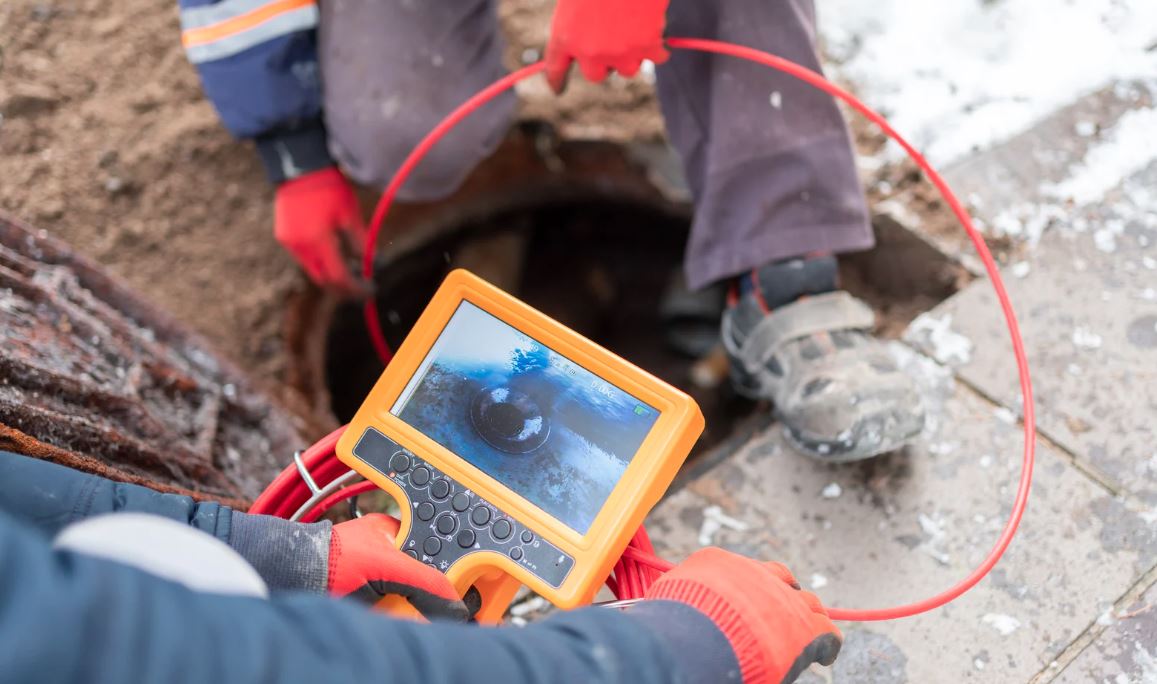 Sewer camera inspection monitor showing inside of a pipe.