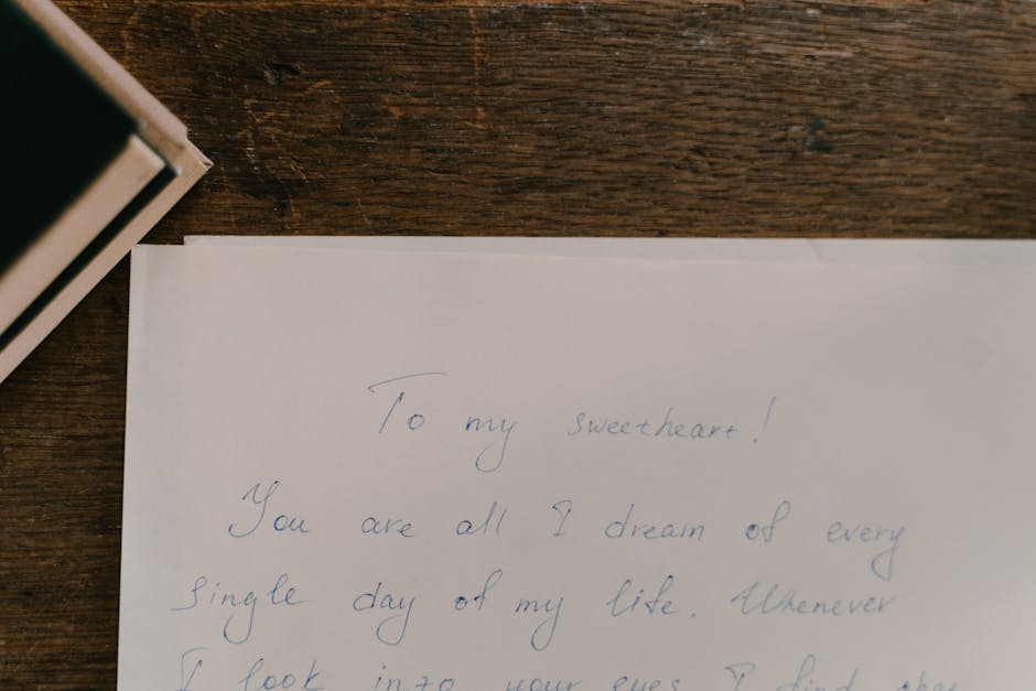 Vintage handwritten letter on a wooden desk - Preserve family history Vintage handwritten letter on a wooden desk - Preserve family history