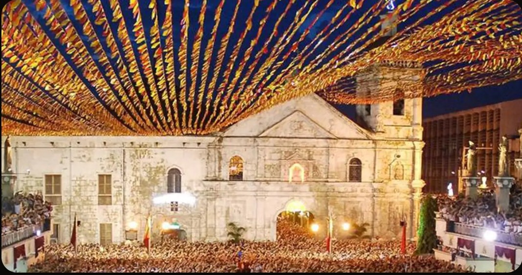 Basilica del Santo Nino lit up at night in Cebu City