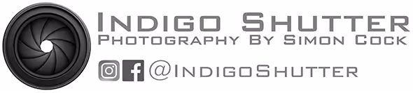 Logo showing a camera shutter icon with the text 'Indigo Shutter Photography By Simon Cock' and social media icons for Instagram and Facebook followed by '@IndigoShutter'.