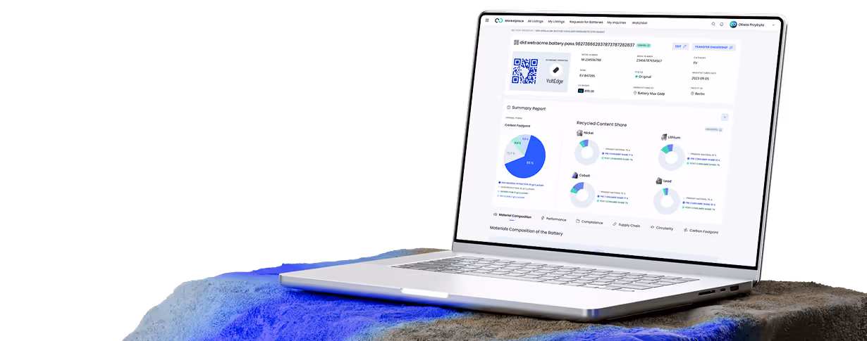 A laptop computer sitting on top of a rock.