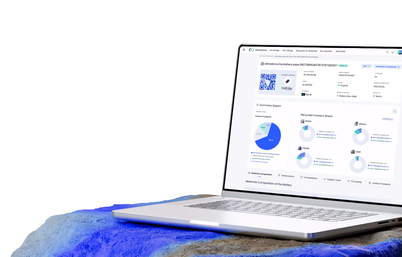 A laptop computer sitting on top of a blue blanket.