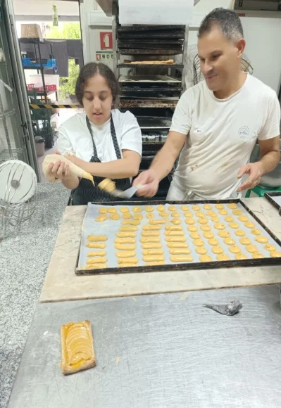 two children making a cake