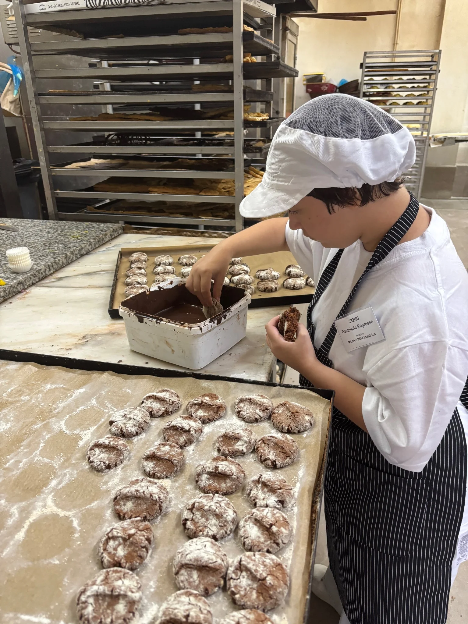 A girl is baking a cake.