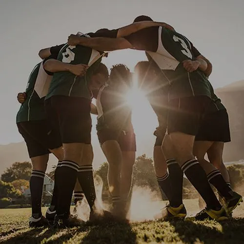 Rugbyspelers in cirkel
