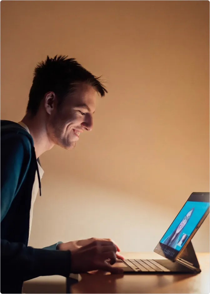 Person holding a tablet displaying a scientific research article titled 'Applications of Australian Native Aquatic Plants on Purifying Wastewater Sources'.