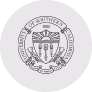 Seal of the Southern California Washington University featuring a shield with scales and a lamp.