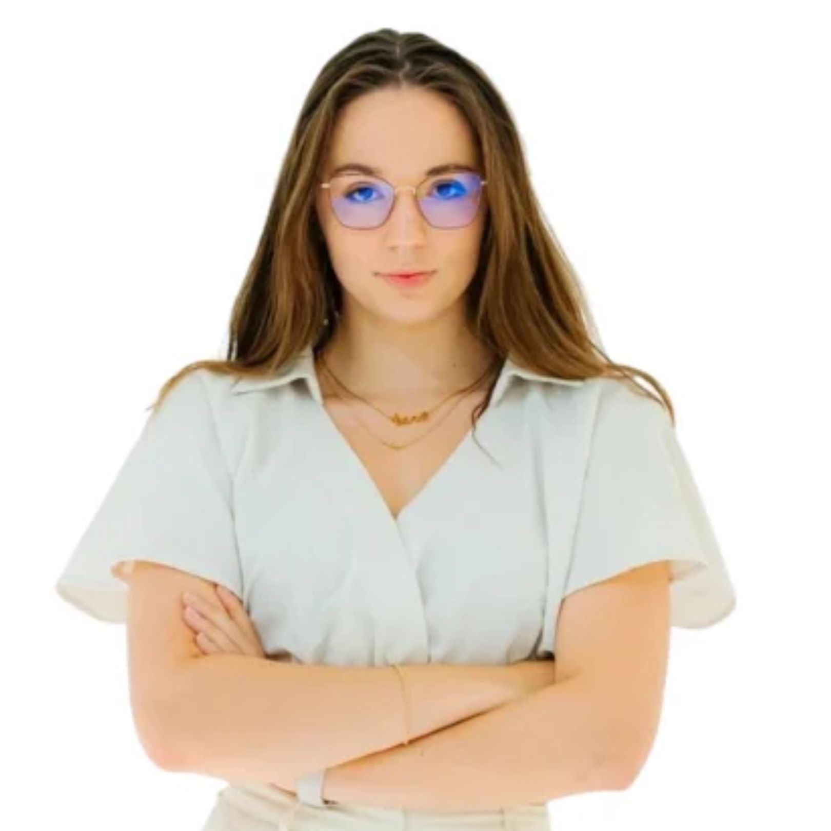 Smiling young woman with short brown hair and tortoiseshell glasses against a white background.