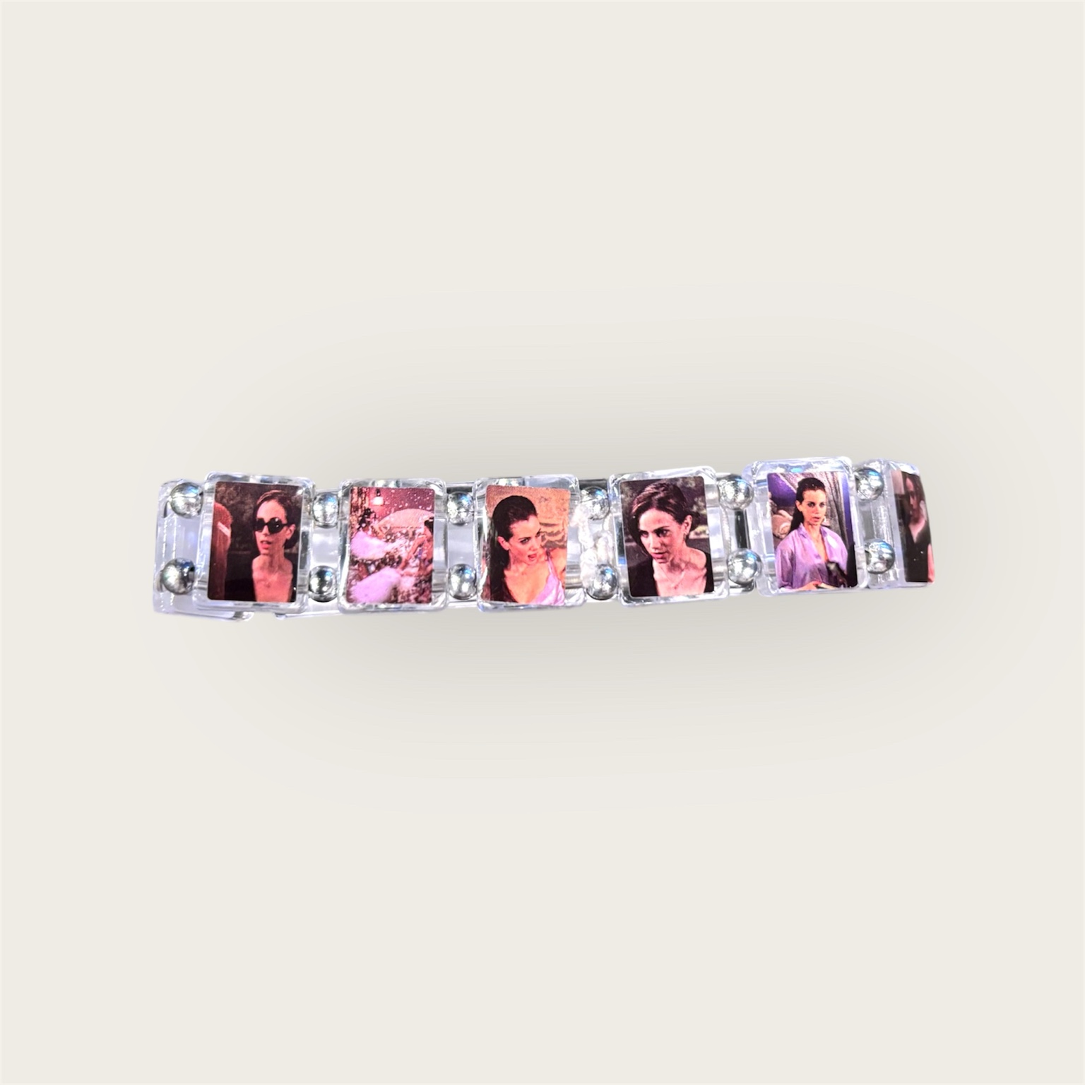 Bracelet featuring small photos of a woman