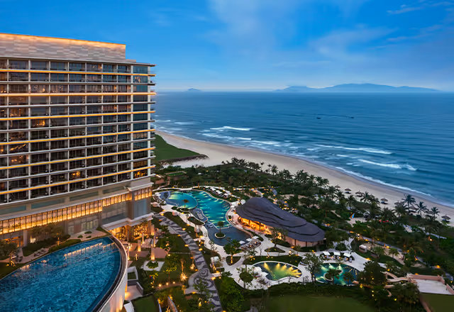 Aerial view of Hoiana Resort & Golf, with lush green golf courses and luxury accommodations.