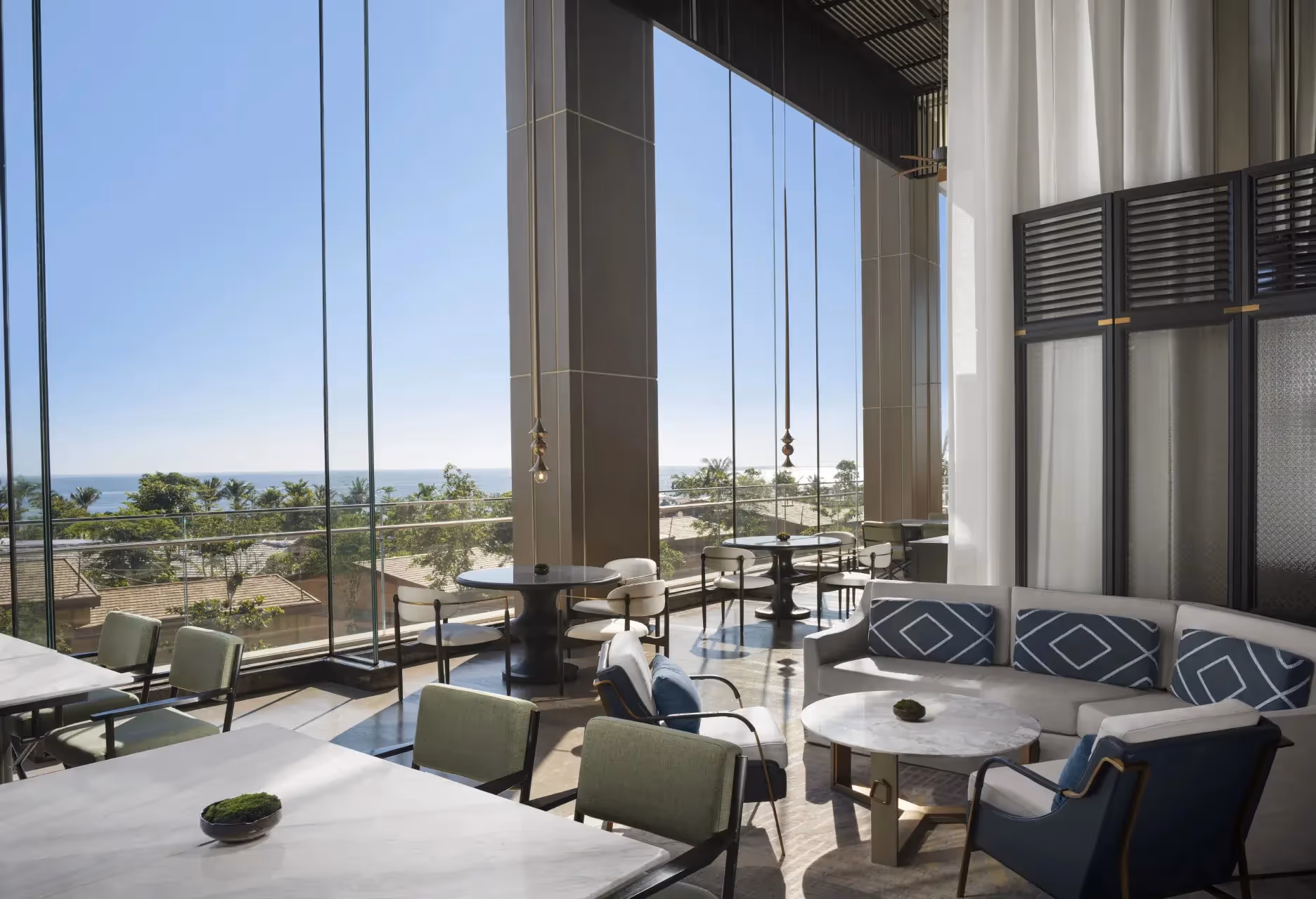 "Scenic view of Hoi An in July, with lanterns lighting up the ancient streets, lush greenery, and visitors strolling through the warm, vibrant atmosphere of summer."