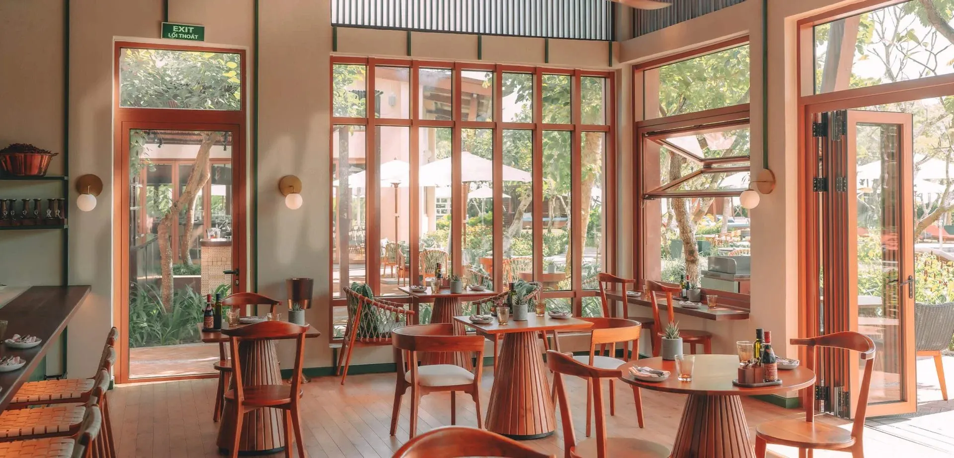 "Cozy Italian restaurant in Hoi An featuring wood-fired pizzas, fresh pasta, and a warm, rustic interior inspired by traditional Italian trattorias."