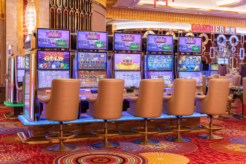 The interior of Hoiana Casino, featuring gaming tables, slot machines, and elegant decor.