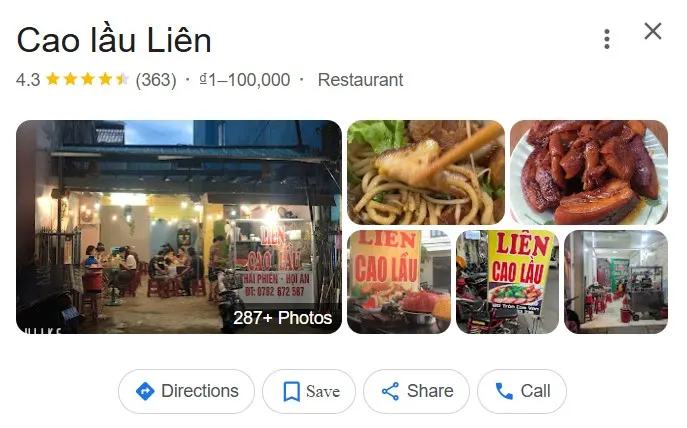 一張會安街頭高樓小吃攤的照片，攤位前擺滿豬肉、香草與酥脆米餅，老闆正在現做一碗熱騰騰的高樓麵，吸引食客排隊等候