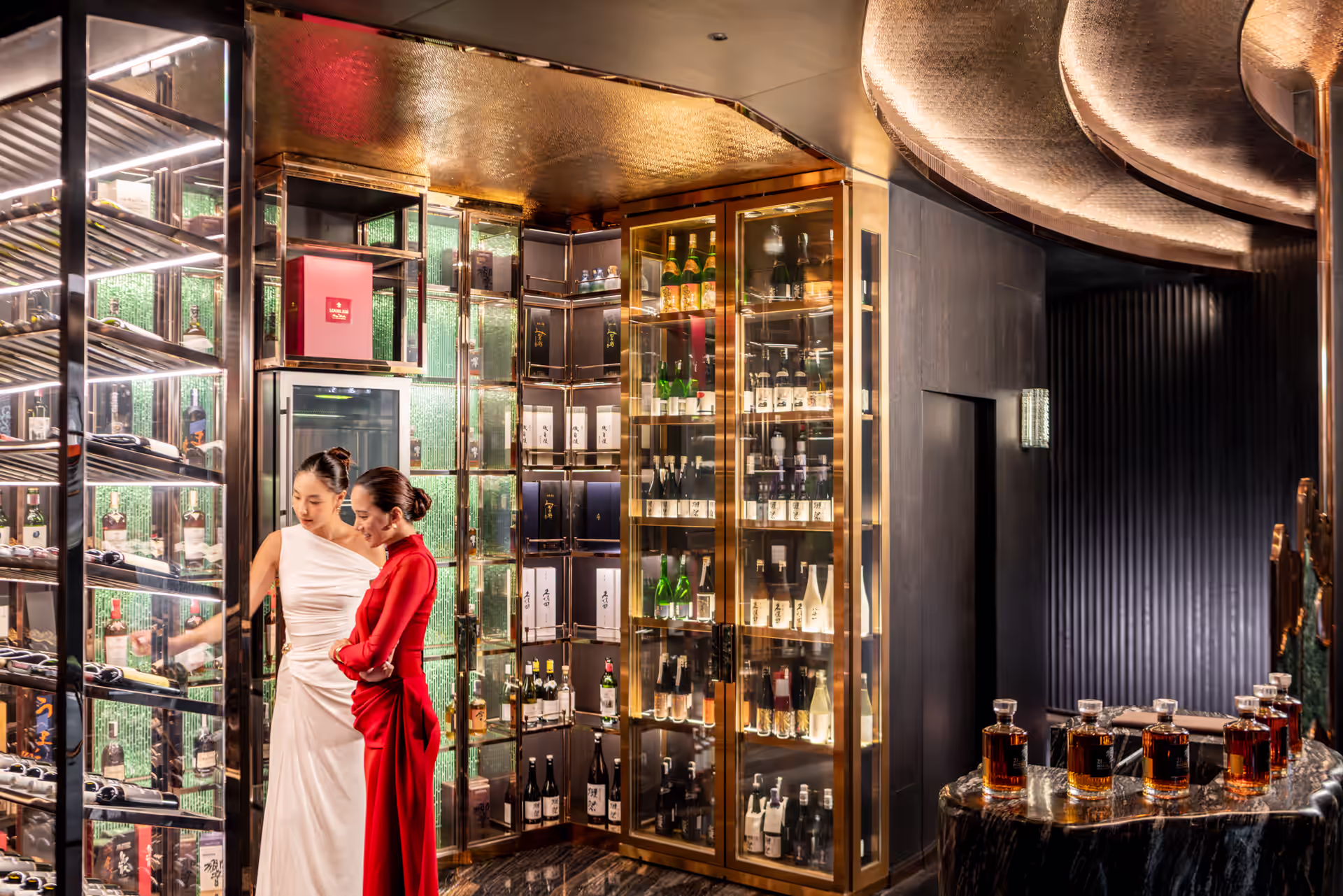 Floor-to-ceiling wine display at the entrance to Gaku Teppanyaki