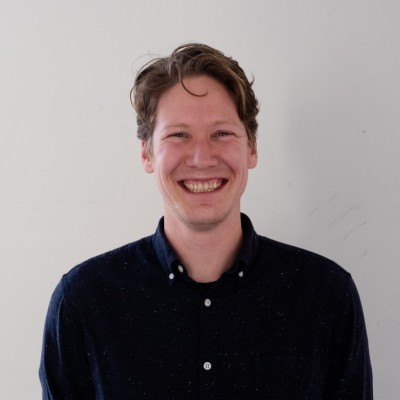 [headshot] image of satisfied student using a laptop