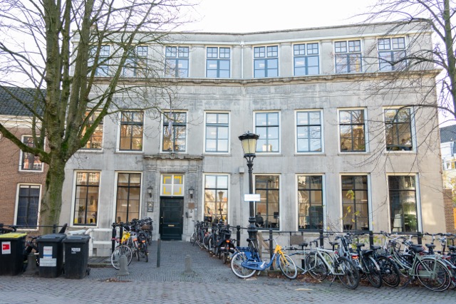 [headshot] image of satisfied student using a laptop