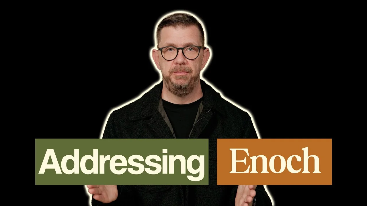 Man with glasses standing between "Addressing" and "Enoch" text blocks.